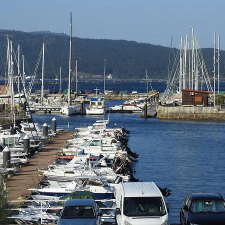 Sobre El Puerto * Muros